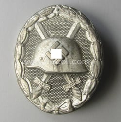 'Verwundeten-Abzeichen in Silber' being a clearly maker- (ie....