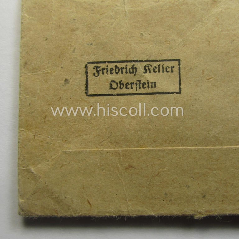 'Ehrenkreuz der deutschen Mutter - dritte Stufe' (or: bronze-class mothers'-cross) that came together with its long-sized (and mint!) ribbon and that came stored in its period pouch (by the maker: 'Friedrich Keller - Oberstein')