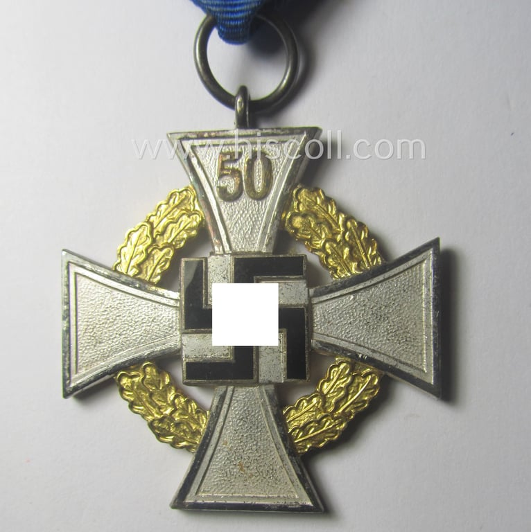 Minimally worn 'Treuedienst Ehrenzeichen' being of the so-called: 'Sonderstufe' as awarded for 50 years of loyal-service and that comes in an overall very nice- (ie. surely issued- and/or used-), condition