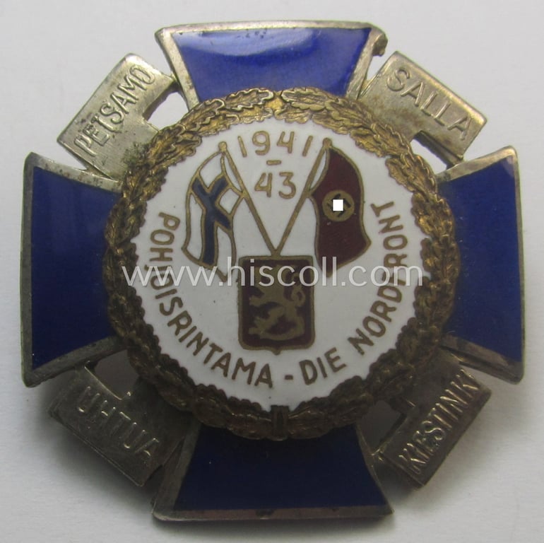 Attractive - and scarcely encountered! - so-called: Finnish-/German: 'Nordfrontkreuz', being a white-/blue-coloured and maker- (ie. 'Hopeatakomo o.y.'-) marked 'variant' that shows the text: 'Pohjoisrintama - Die Nordfront - 1941/43'