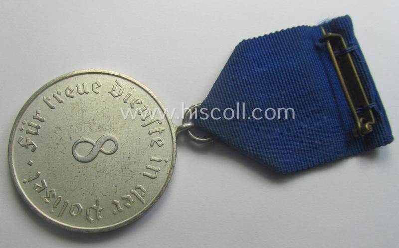 Bright-silver-toned so-called: 'Polizei-Dienstauszeichnung 3. Stufe' (or: police loyal-service medal 3rd class) that comes mounted onto its period ribbon (ie. 'Bandabschnitt')