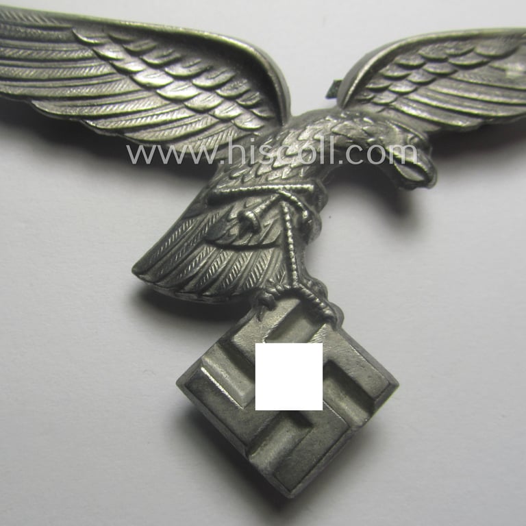 Attractive, silver-coloured- (and/or I deem tin-based), WH (Luftwaffe) related so-called: 'photo-album-device', being a larger-sized & non-maker-marked example depicting an early-period- ie. 'down-tailed' eagle-device