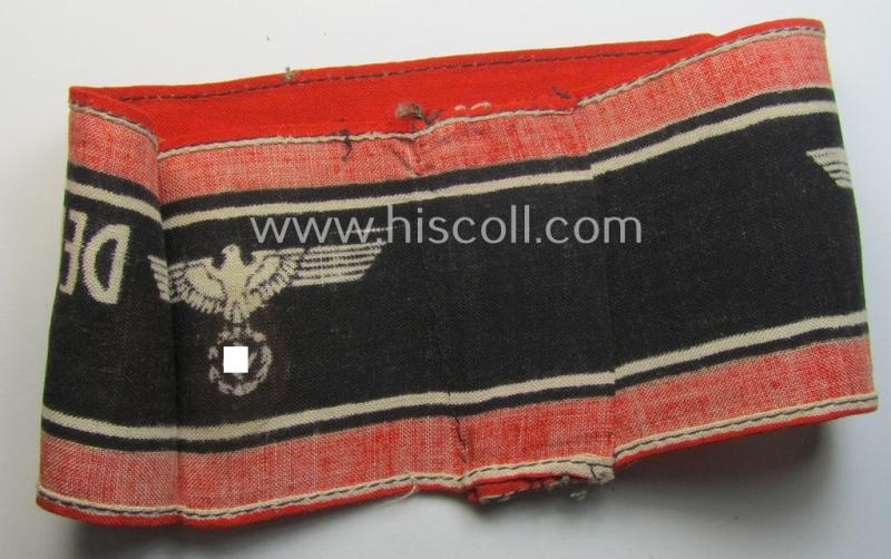 Superb, typically printed- and/or later-war-period, bright-red- and/or black-coloured so-called: 'Deutscher Volkssturm'-armband (ie. 'Armbinde') that comes in an overall very nice- (I deem truly used- and/or worn-), condition
