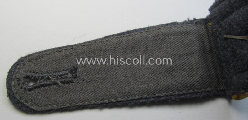 Attractive - albeit regrettably single but still scarcely seen! - WH (Luftwaffe) neatly 'cyphered', NCO-type shoulderstrap as was intended for a: 'Feldwebel der Flieger o. Fallschirmtruppen u. Mitglied einer LW-Kriegsschule'