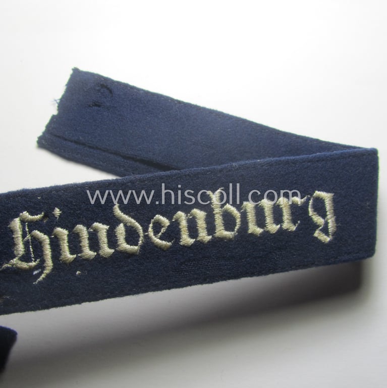 Truly worn, WH (Luftwaffe) cuff-title ie. armband (ie. 'Ärmelstreifen') entitled: 'Geschwader Hindeburg' that comes in a clearly issued- and/or moderately worn, condition