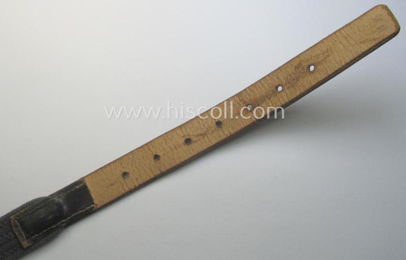 'Standard-issue'-pattern, WH trousers'-belt (or: 'Riemen für Hosen') as was executed in a combination of roughly woven blue-coloured linnen and/or brown-coloured leather
