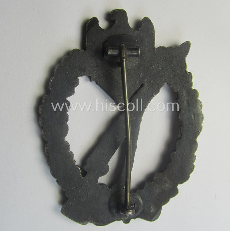 'Infanterie Sturmabzeichen in Bronze' (or: bronze-class infantry-assault badge ie. IAB) being a non-maker-marked,  'oval-crimp'-pattern example as executed in zinc-based metal (ie. 'Feinzink') as produced by the: 'Wilh. Deumer'-company
