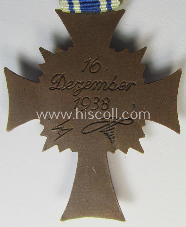 Neat, 'Ehrenkreuz der deutschen Mutter - dritte Stufe' being a non-maker-marked example that comes mounted onto its (large-sized!) ribbon and that comes in an overall very nice- (albeit minimally worn- ie. used-), condition