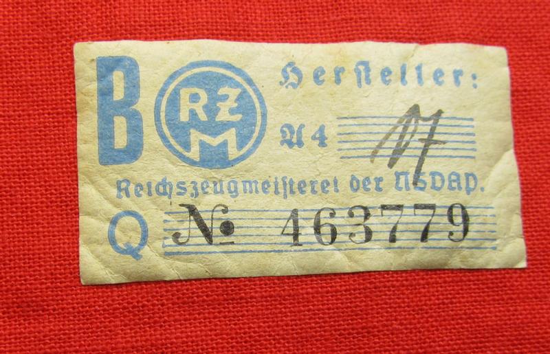 Attractive, linnen-based armband (ie. 'Armbinde') as was intended for usage by the staff of the: 'SA-Wehrmannschaften' (being a hardly used example that still shows its period-attached so-called: 'RzM'-etiket)