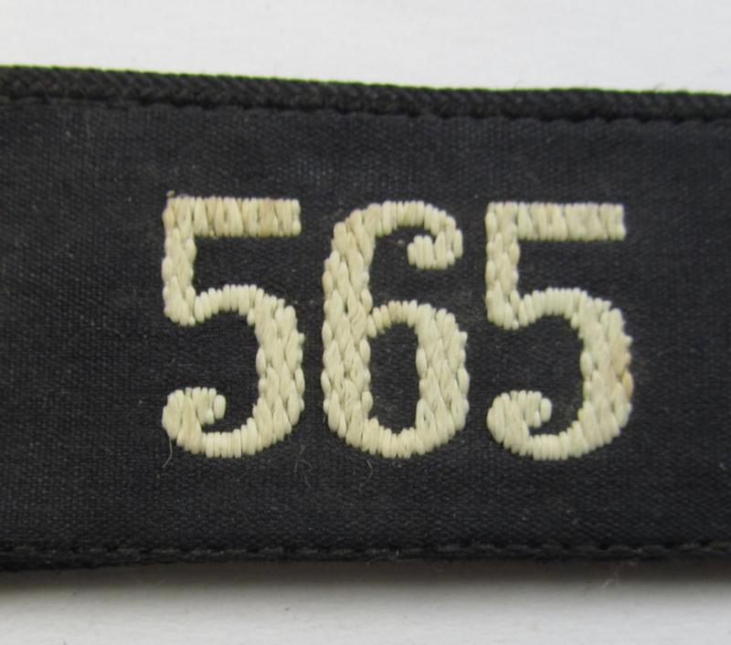 Neat - and naturally single! - black-piped, so-called: 'DJ- o. Deutsches Jungvolk' shoulderstrap as was intended for usage by a: 'DJ-Mitglied' who served within the: 'Bann 565' (565 = 'Spittal') and that comes with its 'RzM'-etiket