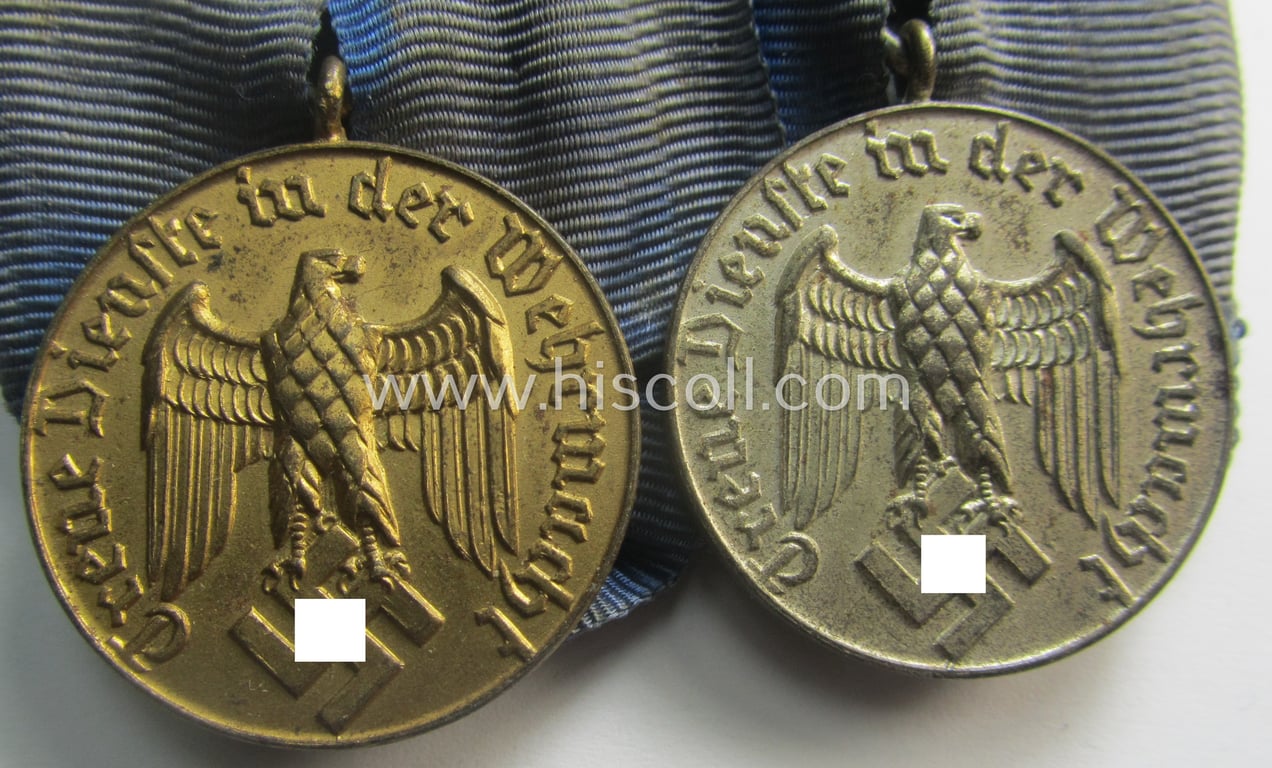 2-pieced medal-bar (ie. 'Spange') showing two: WH (Heeres o. Kriegsmarine) so-called: 'Dienstauszeichnungen für 4 u. 12 Jahre Treue Dienste' that both come period-mounted as a so-called: 'Doppelspange'