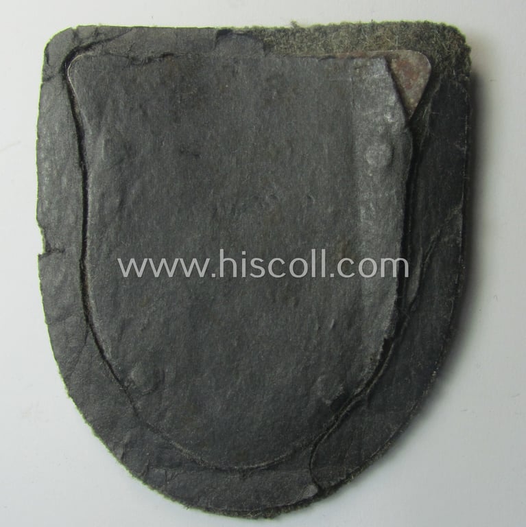 Attractive - truly worn and actually scarcely encountered! - WH (Heeres ie. Waffen-SS) 'Kuban'-campaign-shield that comes mounted onto its original field-grey-coloured- and/or woolen-based 'backing' as issued and/or used