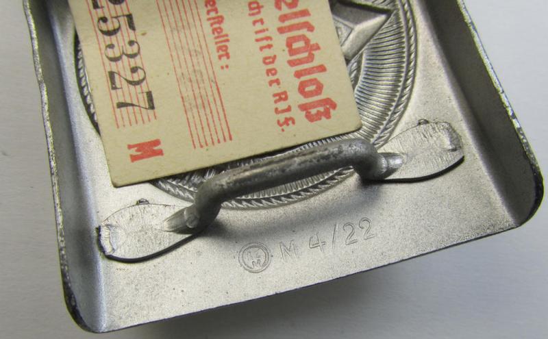 Stunning - and actually rarely encountered! - 'HJ- o. Hitlerjugend'-belt-buckle being a clearly maker- (ie. 'RzM M4/22'-) marked example (with period-attached 'RZM'-etiket!) that comes in an overall wonderful- (ie. 'virtually mint'!-), condit...