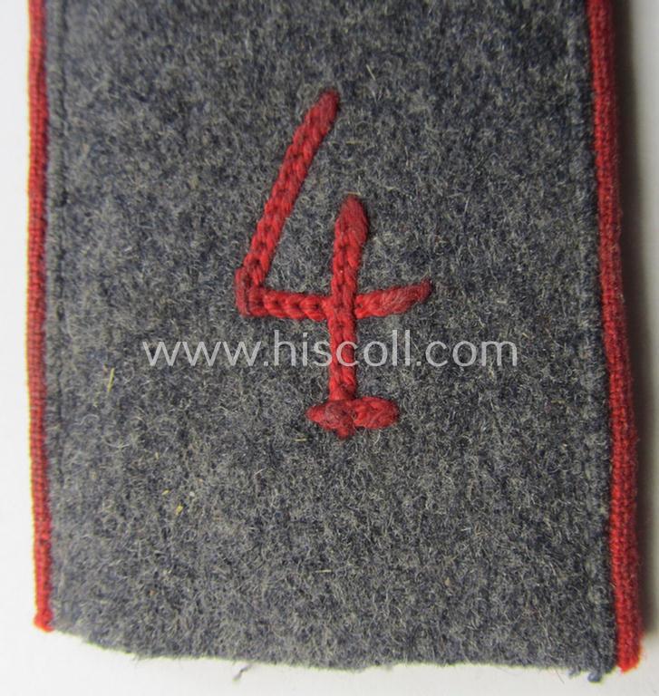 Attractive - albeit regrettably single! - WH (LW) 'cyphered', EM-type shoulderstrap as piped in the bright-red-coloured branchcolour as intended for usage by a: 'Soldat' who served within the: 'Flak-Artillerie-Abteilungs 4'