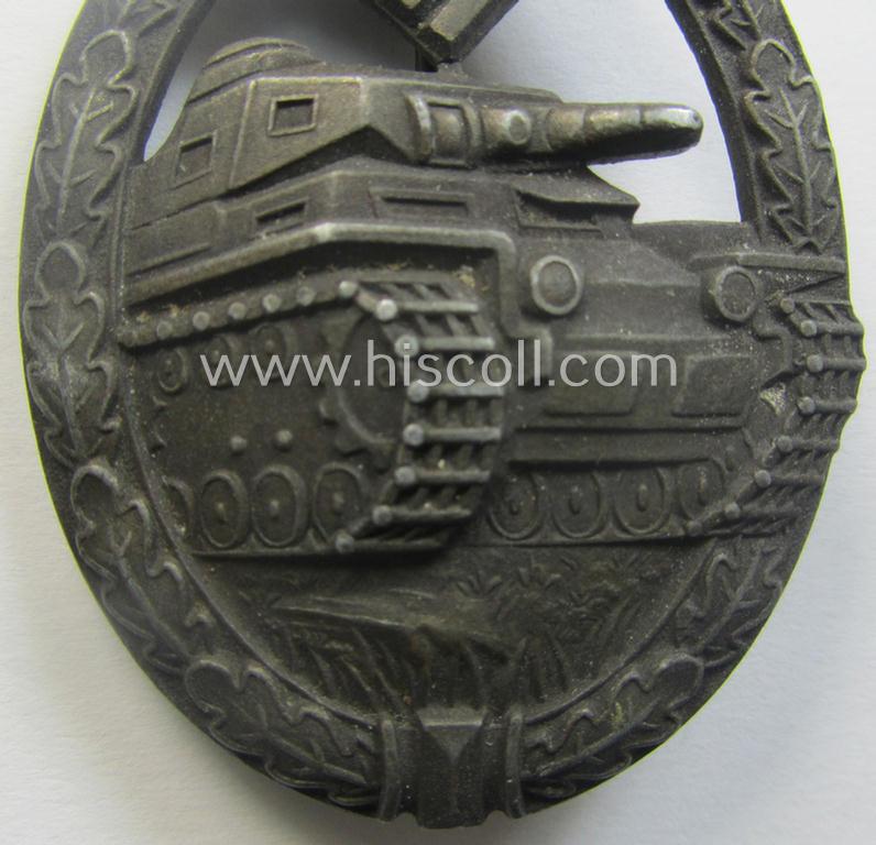 'Panzerkampfabz. in Bronze' (or: bronze-class panzer assault-badge or PAB) being a zinc- (ie. 'Feinzink'-) version (having a so-called: 'horizontal'-catch-set-up) as was (presumably) procuced by the: 'Fritz Zimmermann'-company