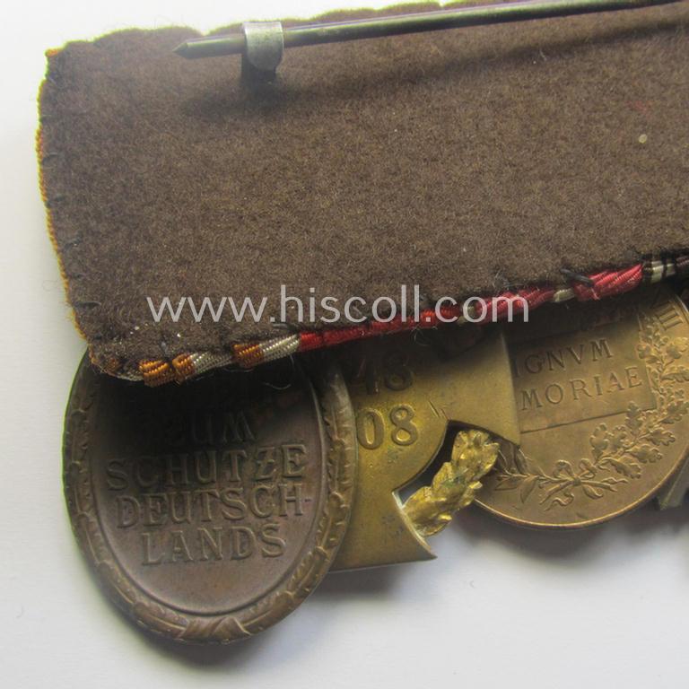 Unusually seen, 8-pieced WWI- (ie. TR- ie. N.S.D.A.P.-) related 'Ordenspange' showing amongst others: an 'N.S.D.A.P-D.A. in Bronze' (ie. '3. Stf. für 10 Jahre t.D.') and various WWI-period Austrian-(Hungarian) awards