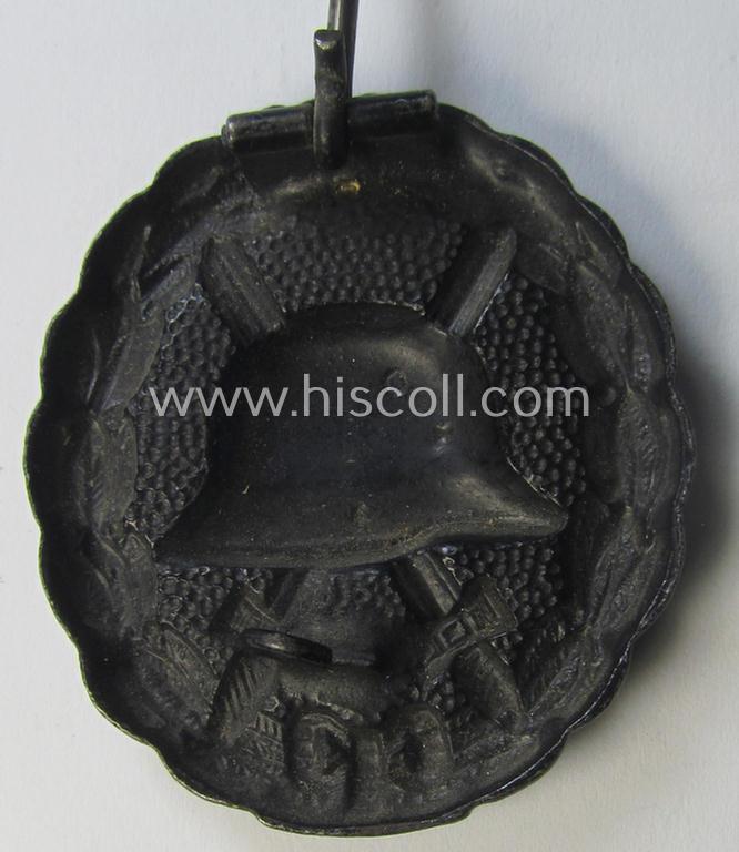 WWI-pattern, black-class wound-badge (ie.: 'Verwundeten Abzeichen in Schwarz') being a very detailed (and magnetic) example that comes in a just minimally used- ie. worn, condition