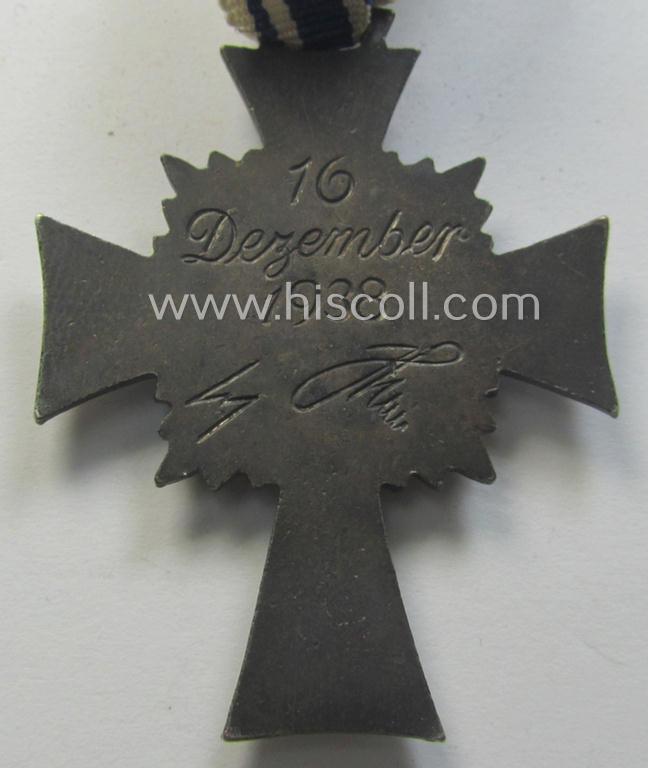 'Ehrenkreuz der deutschen Mutter - zweite Stufe' (or: silver-class mothers'-cross) that came mounted onto its long-sized ribbon as issued and recently found