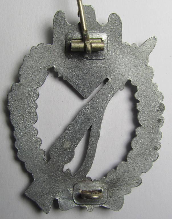Attractive, silver-class 'Infanterie Sturmabzeichen in Silber' being an unmarked (so-called: 'pillow-crimped') example as was executed in silverish-coloured, zinc-based metal (ie. 'Feinzink')