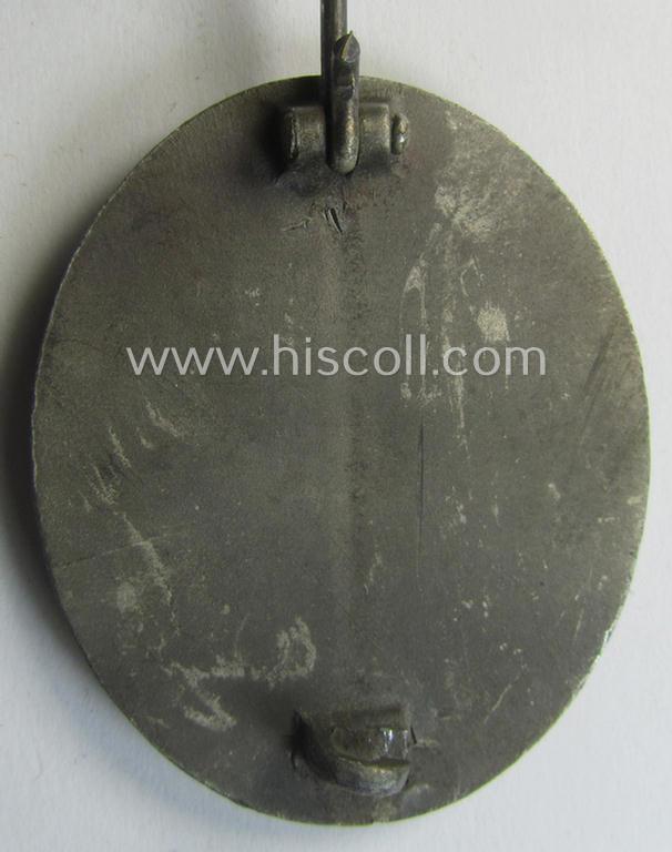 'Verwundeten-Abzeichen in Silber' (ie. silver-class wound-badge) being a maker- (ie. '4'-) marked example as was produced by the: 'Steinhauer u. Lück'-company