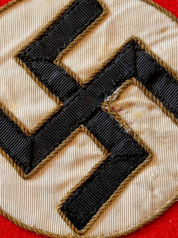 GERMAN WWII AUTHENTIC NSDAP POLITICAL LEADERS THIRD REICH GAU LEVEL ARMBAND WITH RZM PAPER TAG.