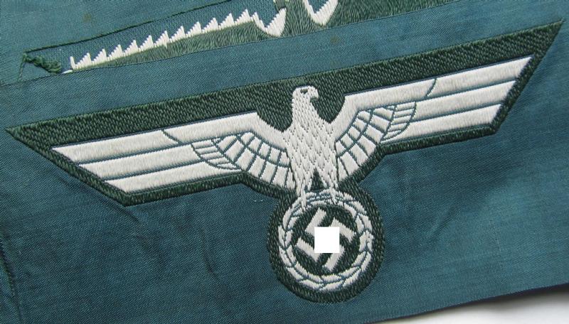 'Virtually mint ie. unissued' example of a WH (Heeres) early- (ie. pre-war-) period- and/or greyish-coloured breast-eagle of the: 'M36'- (ie. 'M40'-) pattern as was executed in the 'BeVo'-weave pattern on a darker-green-coloured background