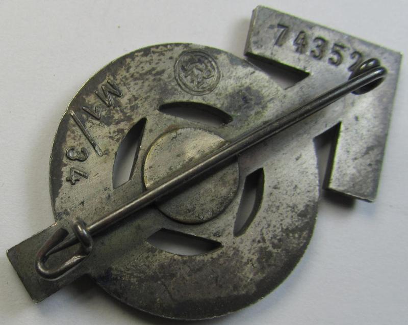 Attractive, HJ- (ie. 'Hitlerjugend'-) sports-badge (or: 'HJ-Leistungsrune') of the silver-class being a clearly maker- (ie. 'RzM - M1/34'-) marked- and/or: 'Buntmetall'-based specimen that shows an engraved (unique) bearers'-numeral ('74352...