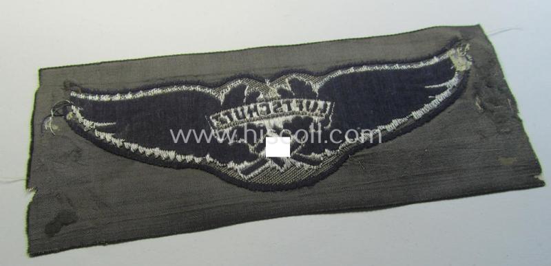 Attractive - and rarely found! - officers'-pattern, so-called: 'Luftschutz' (ie. RLB-) breast-badge (ie. 'Brustabzeichen') as executed in so-called: 'flat-wire', 'BeVo'-weave-pattern and that comes in a 'virtually mint- ie. unissued, condit...