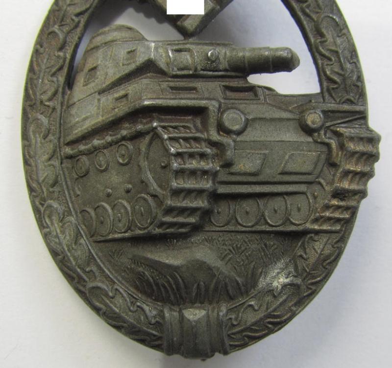 Attractive, 'Panzerkampfabzeichen in Bronze' (or: bronze-class panzer assault badge or PAB) being a neat zinc- (ie. 'Feinzink'-) version (of the so-called: 'horizontal-crimp'-variant) as was procuced by the: 'Steinhauer & Lück'-company