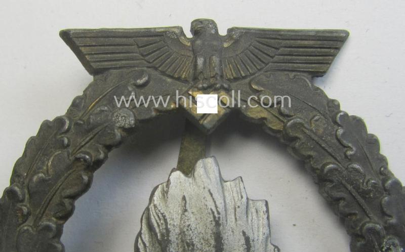 WH (Kriegsmarine) 'Kriegsabzeichen für Minensuch-, U-Boot-Jagd und Sicherungs-Verbände' being a detailed and clearly maker- (ie. 'R.K.') marked, 'Feinzink'-based example as was produced by the 'Rudolf Karneth'-company