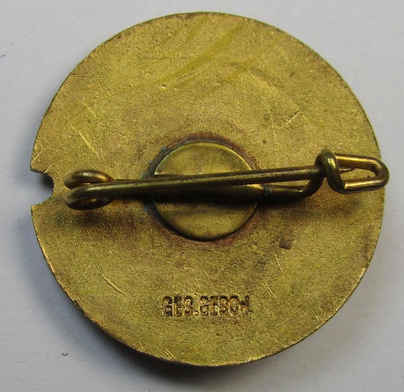Attractive, bright-golden-toned membership lapel-pin (ie. 'Goldene Ehrennadel für 25 jährige Mitgliedschaft') within the: 'Nationalsozialistischer Deutscher Marinebund' (ie. NSDMB) being a nicely preserved example