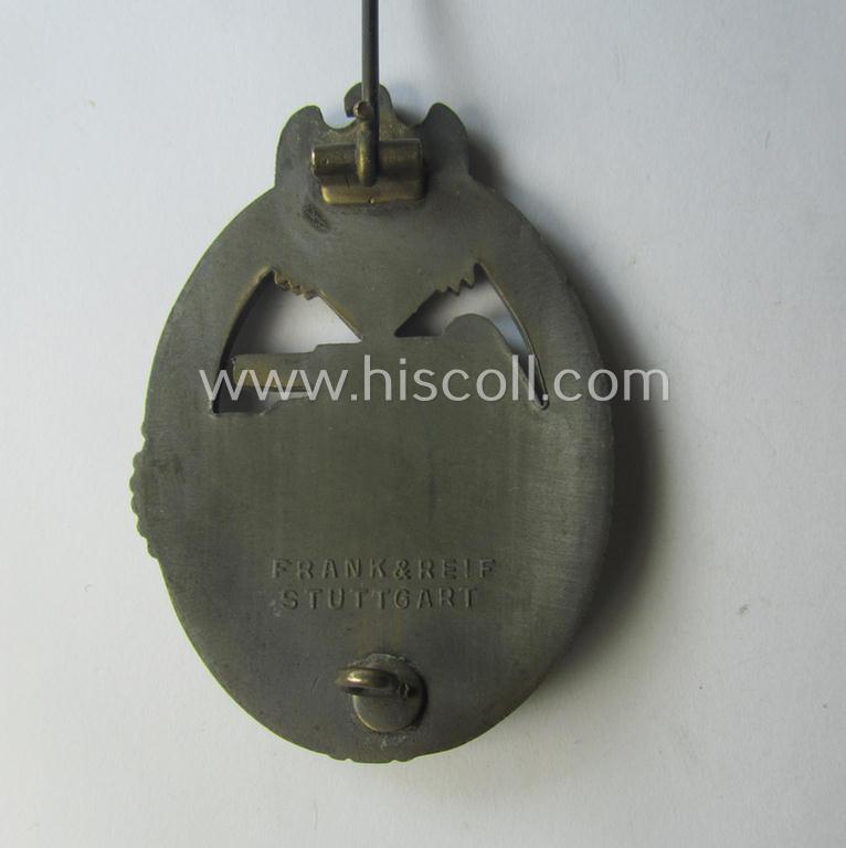'Panzerkampfabzeichen in Bronze' (or: bronze-class panzer assault-badge or PAB) being a neat (I deem) somewhat later-war-period zinc- (ie. 'Feinzink'-) version as was procuced by the: 'Frank u. Reif'-company