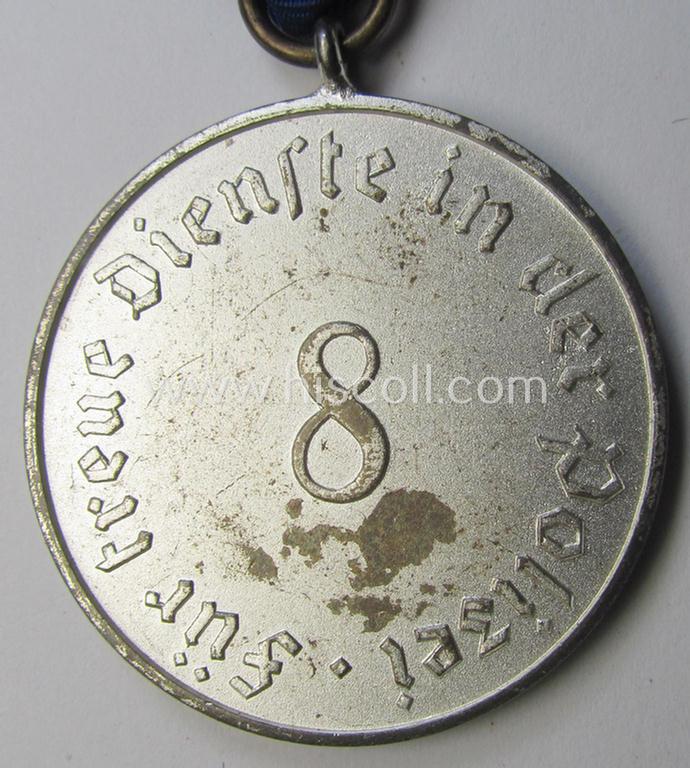 Attractive, bright-silver-toned so-called: 'Polizei-Dienstauszeichnung der 3. Stufe' (or: police loyal service medal of the 3rd class as was awarded for 8 years of service) that comes mounted on its period ribbon (ie. 'Bandabschnitt') as issued
