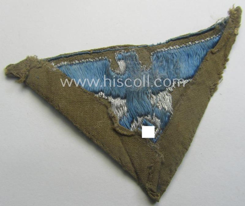 SA-related cap-eagle as was intended for the: 'Lagermütze' (ie. side-cap) being an example as woven on a bright-blue-coloured background and as such intended for members within the: 'SA-Gruppe Warthe o. Oberrhein'