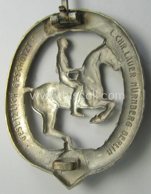 'Deutsches Reiterabzeichen der 2. Klasse (ie. 'in Silber') being a clearly maker- (ie. 'L.Chr. Lauer'-) marked example that comes in an overall nice- (albeit moderately used- ie. worn-), condition