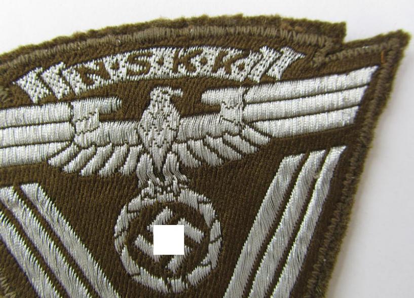 Very nice - and actually scarcely encountered! - N.S.K.K. (ie. 'National Socialistisches Kraftfahr Korps') so-called: 'N.S.K.K.-Ärmelabzeichen' showing a combined arm-eagle and/or chevron - overall very nice condition!