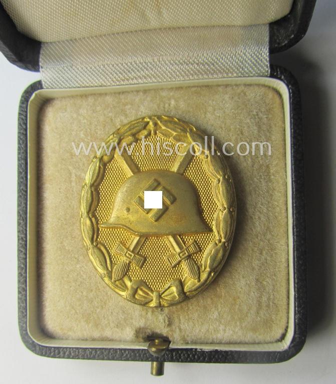Rarely encountered 'Verwundeten-Abzeichen in Gold' being a clearly maker- (ie. 'L/11'- by 'Wilh. Deumer') marked- and typical 'Buntmetall'-based example that comes stored in its period- (and LDO-marked!) etui