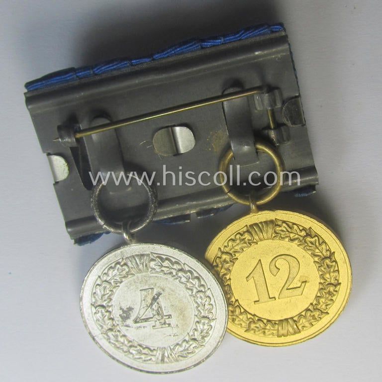 2-pieced medal-bar (ie. 'Spange') showing two: WH (Heeres o. Kriegsmarine) so-called: 'Dienstauszeichnungen für 4 u. 12 Jahre Treue Dienste' that both come period-mounted as a so-called: 'Doppelspange'