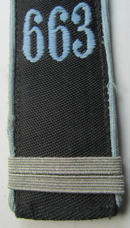 Neat - albeit regrettably single! - so-called: 'Flieger-HJ' (ie. flight 'Hitlerjugend') shoulderstrap as was intended for usage by a: 'HJ-Oberrottenführer' who was attached to the: 'Bann 663' (Bann 663 = Litzmannstadt/Wartheland)