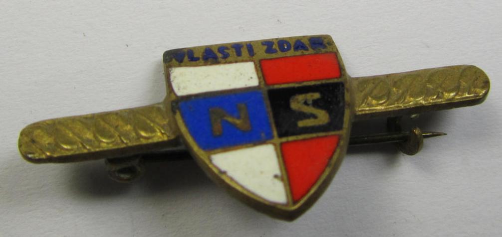 Pair of enamelled Slovakian- ie. Axis party-insignia as both intended for the WWII-period, Slowakian facist-party called: 'Nàrodni Sourucenstvi (NS)' both insignia coming in an overall nice albeit clearly used- ie. worn condition