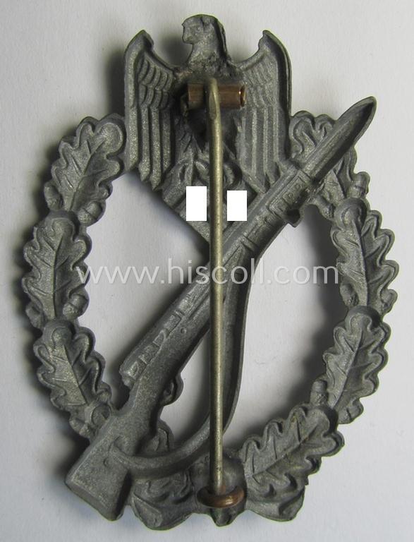 'Infanterie Sturmabzeichen in Silber', being an unmarked (and/or very converse- ie. vaulted-) 'hollow-back' example by the maker: 'Friedrich Linden' (ie. 'F.L.L.') as was executed in silver-coloured, zinc-based metal (ie. 'Feinzink')