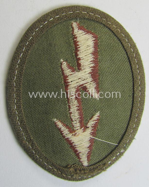 WH (Heeres) 'tropical-styled', trade- and/or special-career insignia (or: 'Signal Blitz') as was intended for a soldier who served within the: 'Kradschützenbtle. der Pz. Div. u. Inf. Divisione (mot.)'