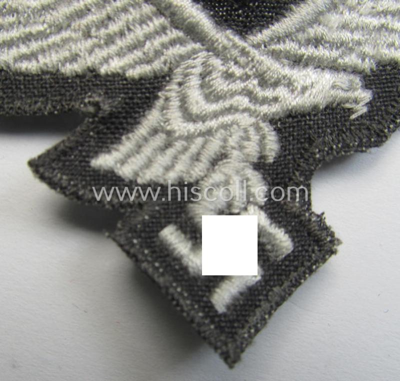 Superb, 'variant'-pattern WH (Luftwaffe) EM- (ie. eventually NCO-) type side-cap eagle (being a 'virtually mint- ie. unissued' example as executed in typical machine-embroidered-pattern onto an unusally seen 'thin-shaped'-background)