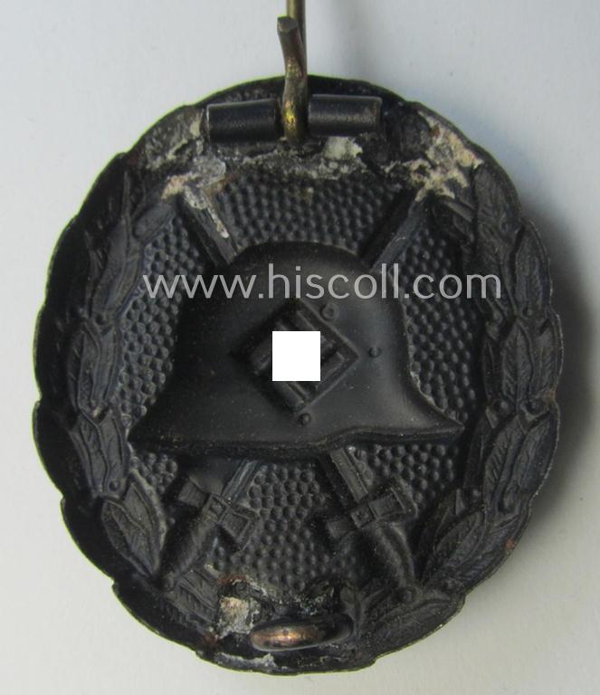 Attractive, early-pattern black-class wound-badge (ie.: 'Verwundeten Abzeichen in Schwarz') being a detailed so-called: 'Spanish Civil-War'-version that comes in a just moderately used- and/or worn, condition