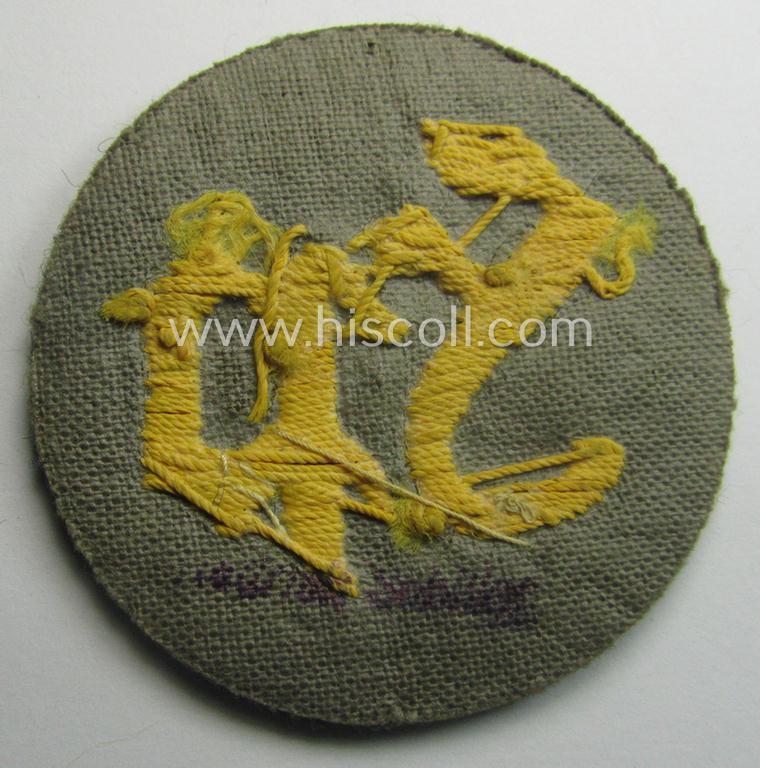 WH (Heeres) so-called: trade- and/or special-career arm-insignia as was intended for a: 'Festungspionier-Feldwebel' (being a neatly hand-embroidered 'variant' as mounted on field-grey-coloured wool)