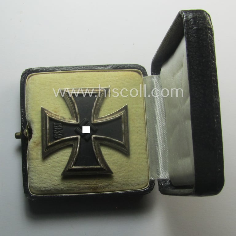 'Eisernes Kreuz 1. Kl.' (or: Iron Cross 1st class) being a (typical) maker- (ie. 'L/13'-) marked example as was produced by the maker (ie. 'Hersteller'): 'Paul Meybauer' and that comes in its original etui as issued