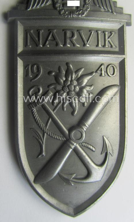 'Virtually mint' - albeit regrettably incomplete - example of a WH (Heeres etc.) 'Narvik'-campaign-shield as executed in typical: 'Feinzink' (as was presumably produced by the: 'Wilhelm Deumer'-company)
