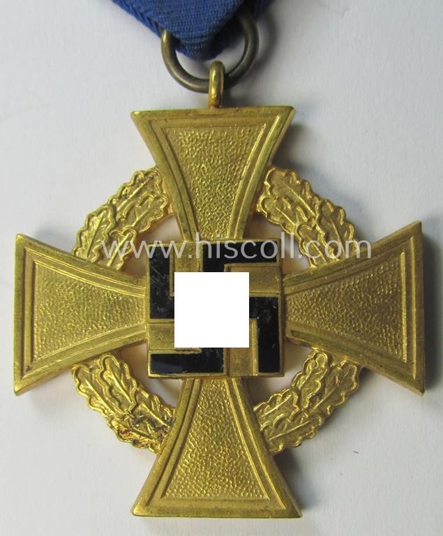 'Treuedienst Ehrenzeichen 1. Klasse' being a (typical) non-maker-marked example that came mounted onto its original ribbon (ie. 'Bandabschnitt') and that comes stored in its equally non-maker-marked etui as issued