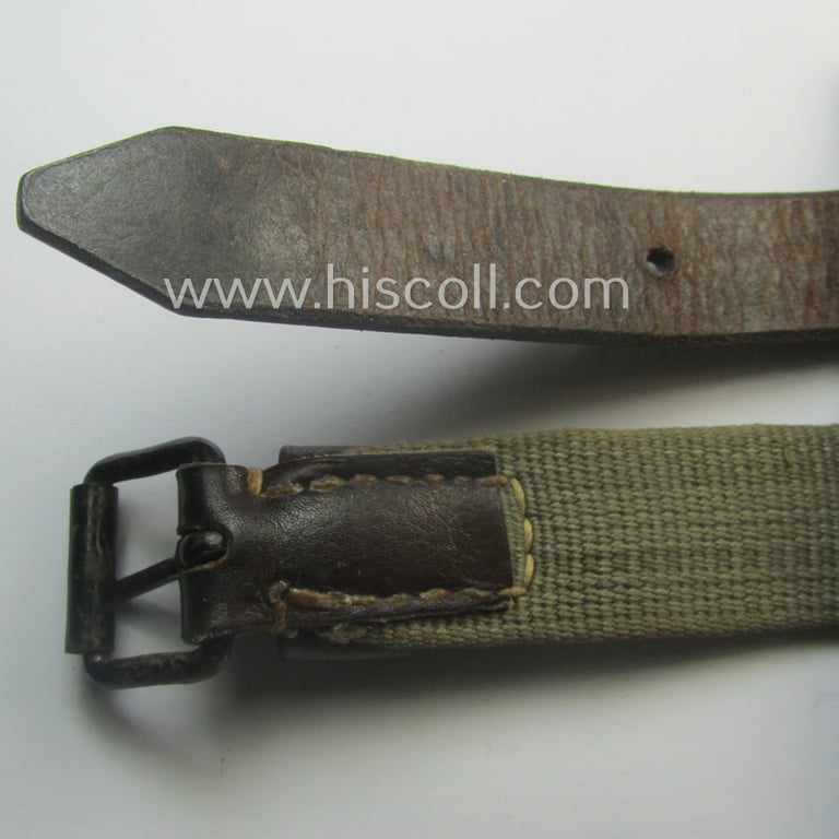 'Standard-issue'-pattern, WH trousers'-belt (or: 'Riemen für Hosen') as was executed in a combination of woven, field-grey-coloured linnen and/or brownish/black-coloured leather
