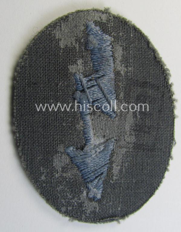 WH (Heeres) trade- and/or special-career-insignia ie. hand-embroidered 'signal-blitz' being a maker- (ie. 'G&B'-) marked example as was specifically intended for a soldier within the: 'Nachschub-Truppen'